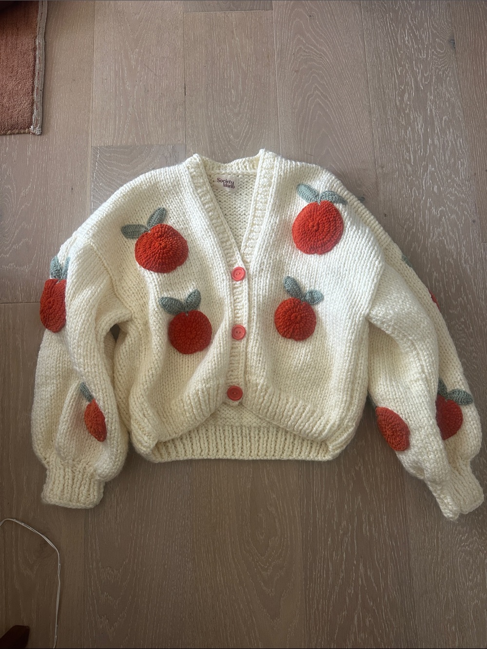 Society Mano Cream Knit Cardigan with Orange Pom Fruit Appliqués